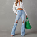 High Waist Ripped Denim Pants Women Streetwear Flare Jeans Long Pants